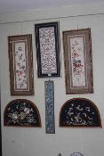 Six framed and glazed Oriental embroideries including two pairs.