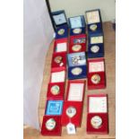 Collection of twelve Halcyon Days pill boxes, boxed with certificates.