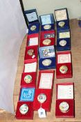 Collection of twelve Halcyon Days pill boxes, boxed with certificates.