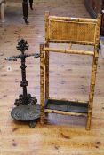 Victorian bamboo two division stick stand and cast iron stick stand (2).