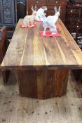 Naturalistic hardwood rectangular dining table, 77cm high by 211cm long by 91cm wide.