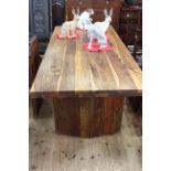 Naturalistic hardwood rectangular dining table, 77cm high by 211cm long by 91cm wide.