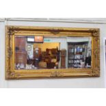 Large rectangular gilt framed bevelled wall mirror, 182cm by 96.5cm overall.