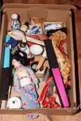 Box of Oriental dolls, fans, pottery fish.