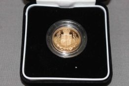 The 2002 United Kingdom gold proof sovereign by The Royal Mint in box with COA No. 09132.