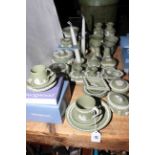 Collection of Wedgwood Green Jasperware including vases, two pairs of dwarf candlesticks,