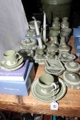 Collection of Wedgwood Green Jasperware including vases, two pairs of dwarf candlesticks,