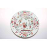 Large Chinese famille rose charger decorated with three figures and phoenix in garden setting,