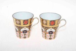 Two Royal Crown Derby Imari pattern mugs.