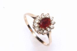 9 carat gold, zirconia and coloured stone (garnet?) ring, size O.