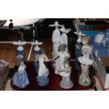 Four Lladro Nun figures and five Nao figures including two ballerinas.