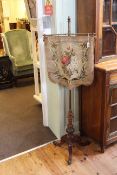 Victorian mahogany and brass tripod pole screen having adjustable embroidered banner, 151cm high.