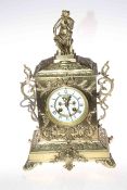 Highly decorative brass mantel clock with a knight as the top centre piece, 40cm high.