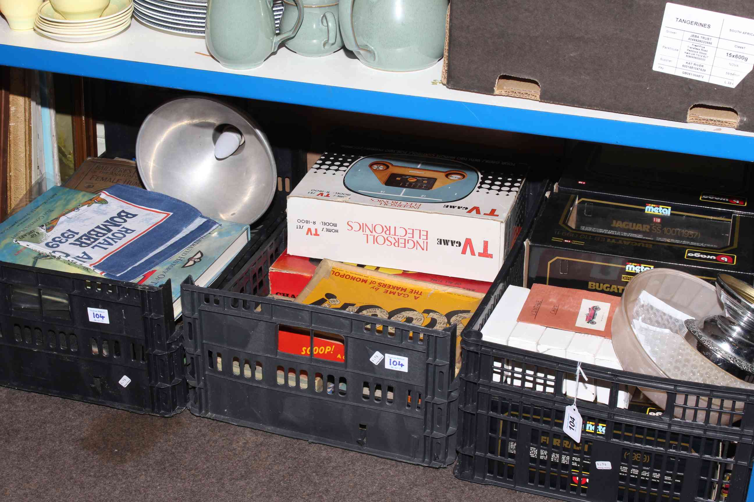 Three boxes of model vehicles including Burago, vintage games,
