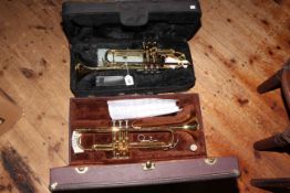 Two cased trumpets, Sonata and Windsor.