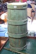 Green painted barrel stick stand, 66cm high by 28cm diameter.