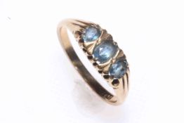 9 carat gold and three blue stone ring, size P.