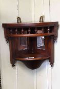 Edwardian oak mirror panelled corner wall shelf, 34cm.