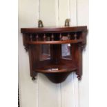 Edwardian oak mirror panelled corner wall shelf, 34cm.