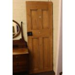 Stripped pine panelled door, 201cm by 71cm.