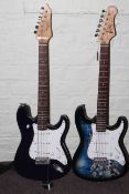 Two electric guitars, Liberty 303 and Jaxville.