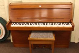 Lindner, upright overstrung piano, 106cm high by 134cm wide, together with a piano stool.