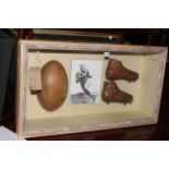 Cased Johnny Lujack America Football boots and ball.