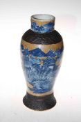 Chinese blue and white on brown baluster vase decorated with figures on bridge and pagoda,