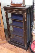 Victorian ebonised and gilt mounted glazed door pier cabinet, 123cm high by 72cm wide by 35cm deep.