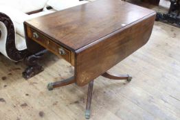 Regency inlaid mahogany Pembroke table having frieze drawer and raised on ring turned pedestal to