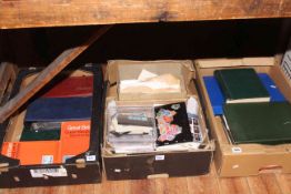 Three boxes of worldwide stamp albums and loose, together with FDCs.