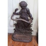 Cast stick stand modelled as a child grasping a serpent, 81cm high by 47cm wide by 24cm deep.