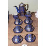 Fifteen piece Japanese blue and gilt decorated coffee service.