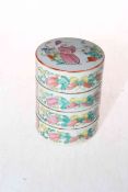 Chinese famille rose three height stacking boxes and cover, the sides decorated with butterflies,