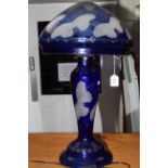 Decorative butterfly blue glass lamp. 67cm high.