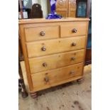 Pine chest of two short above three long drawers on turned legs,