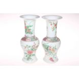 Pair Chinese famille rose vases, with floral sprays and patterned shoulder, 25cm.