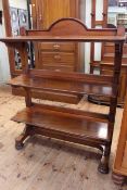 Shoolbred & Co mahogany three tier etagere bearing enamelled label to reverse,