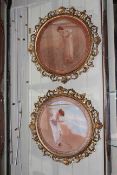 Pair circular coloured prints of ladies in ornate gilt frames.