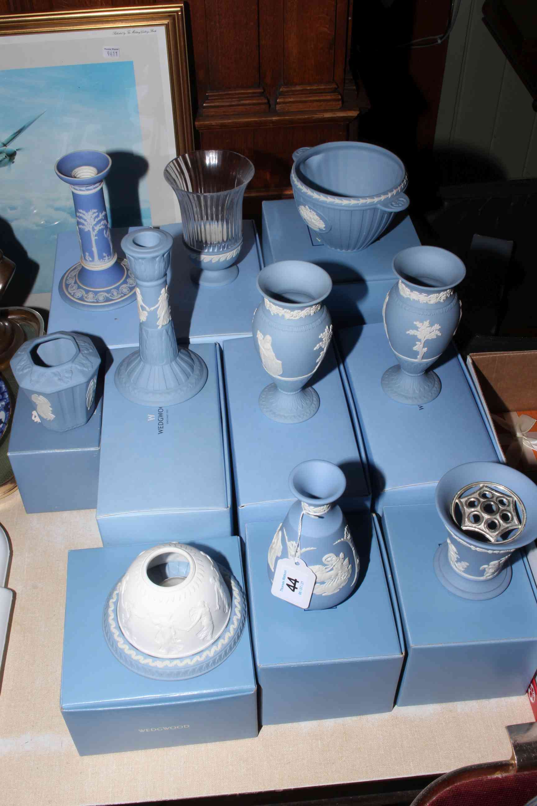 Collection of boxed blue Jasperware including vases, candlesticks, tea lights, etc.