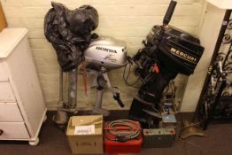 Three outboard motors and accessories.