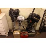 Three outboard motors and accessories.