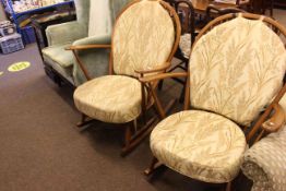 Pair vintage Ercol rocking chairs.