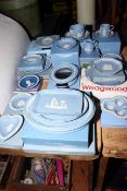 Collection of Wedgwood Blue Jasperware including cups and saucers, photograph frames, trays,