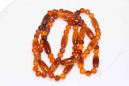 Amber colour bead necklace, length 120cm.