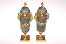Pair gilt metal mounted marble urns, 31cm.