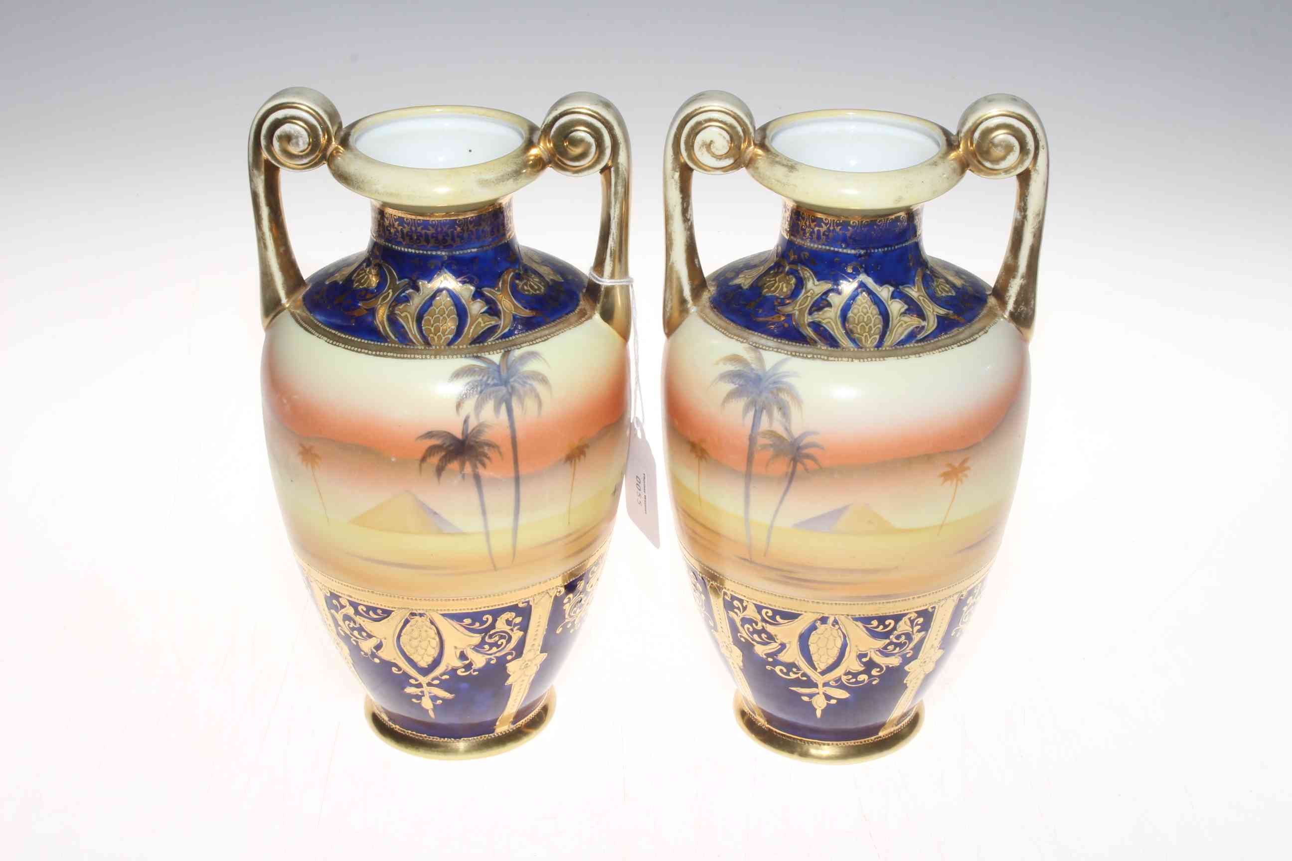 Pair Noritake desert scene two handle vases, 24.5cm. - Image 2 of 2