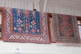 Turkish rug with a blue ground and certificate 1.65 by 1.18 and Eastern design runner 2.50 by 0.78.