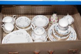 Vintage luggage case including part tea wares.