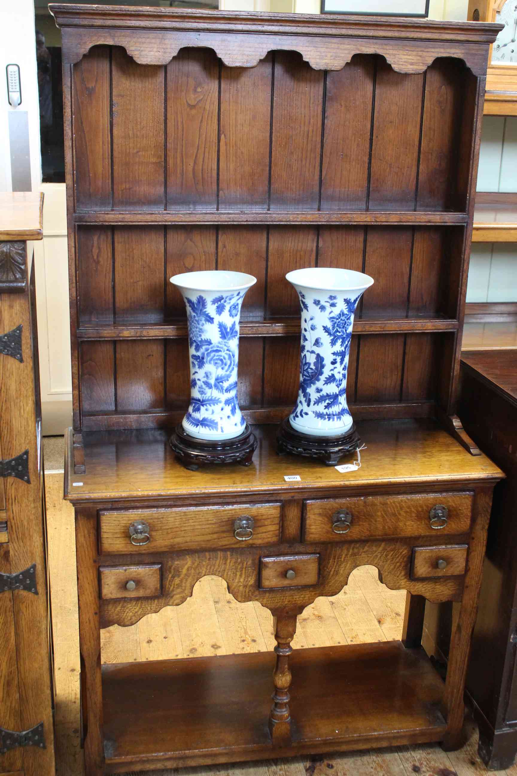 Titchmarsh & Goodwin neat oak potboard dresser and rack, 163cm high by 92cm wide by 37cm deep.